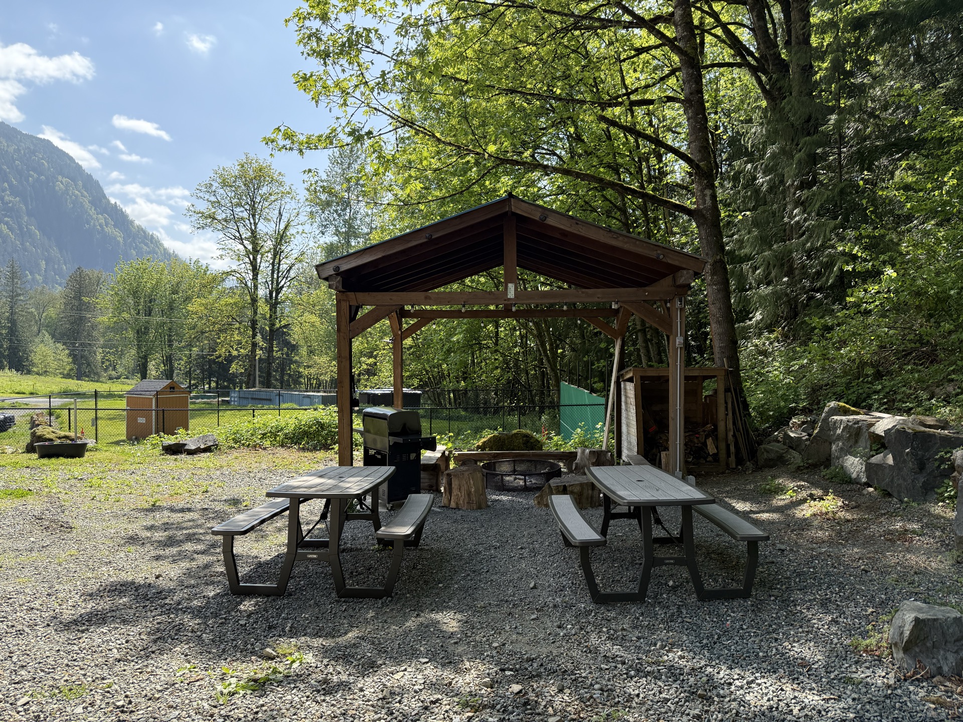 The covered fire-pit gazebo on the grounds