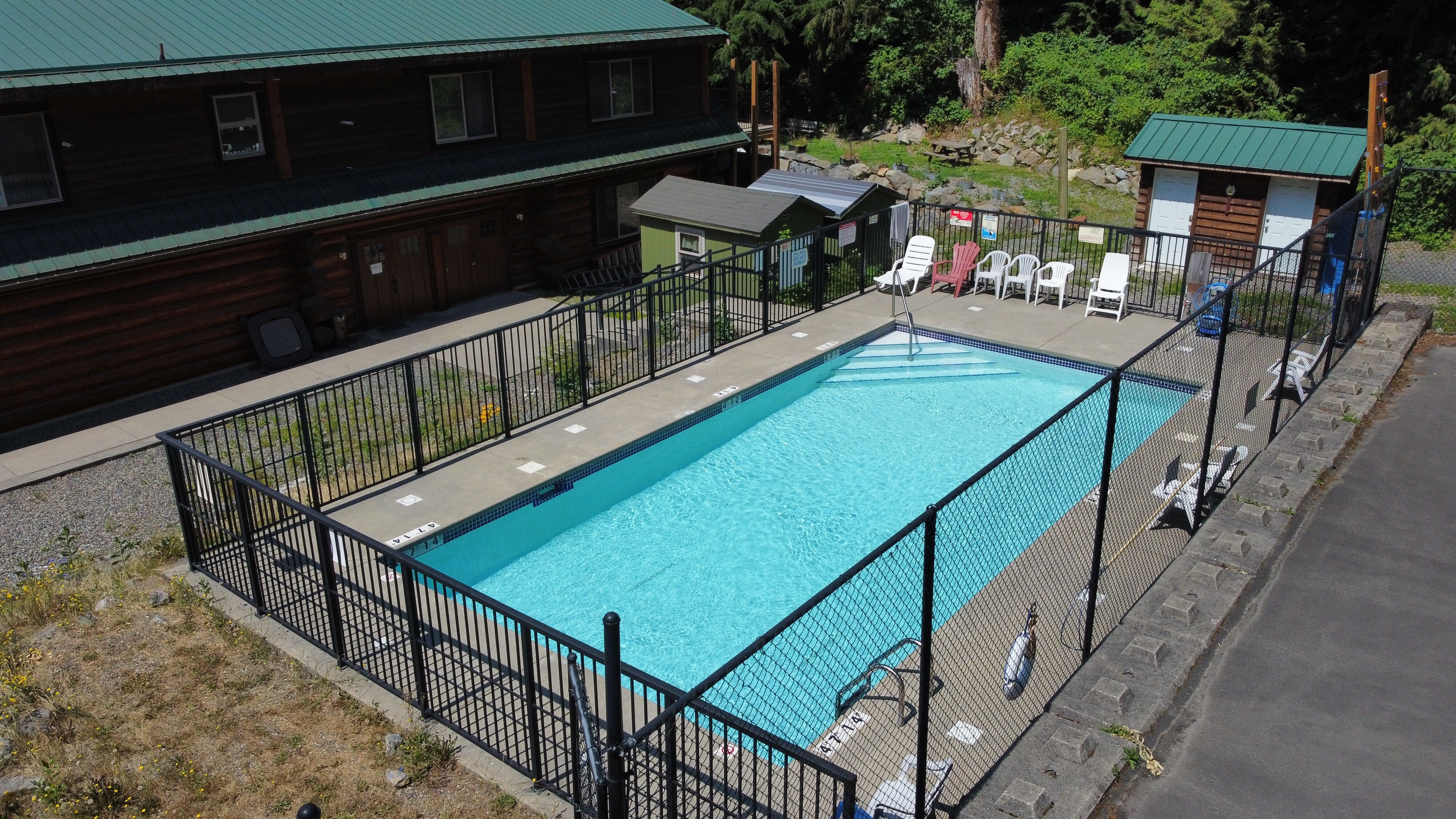 Looking down on the pool deck beside the lodge