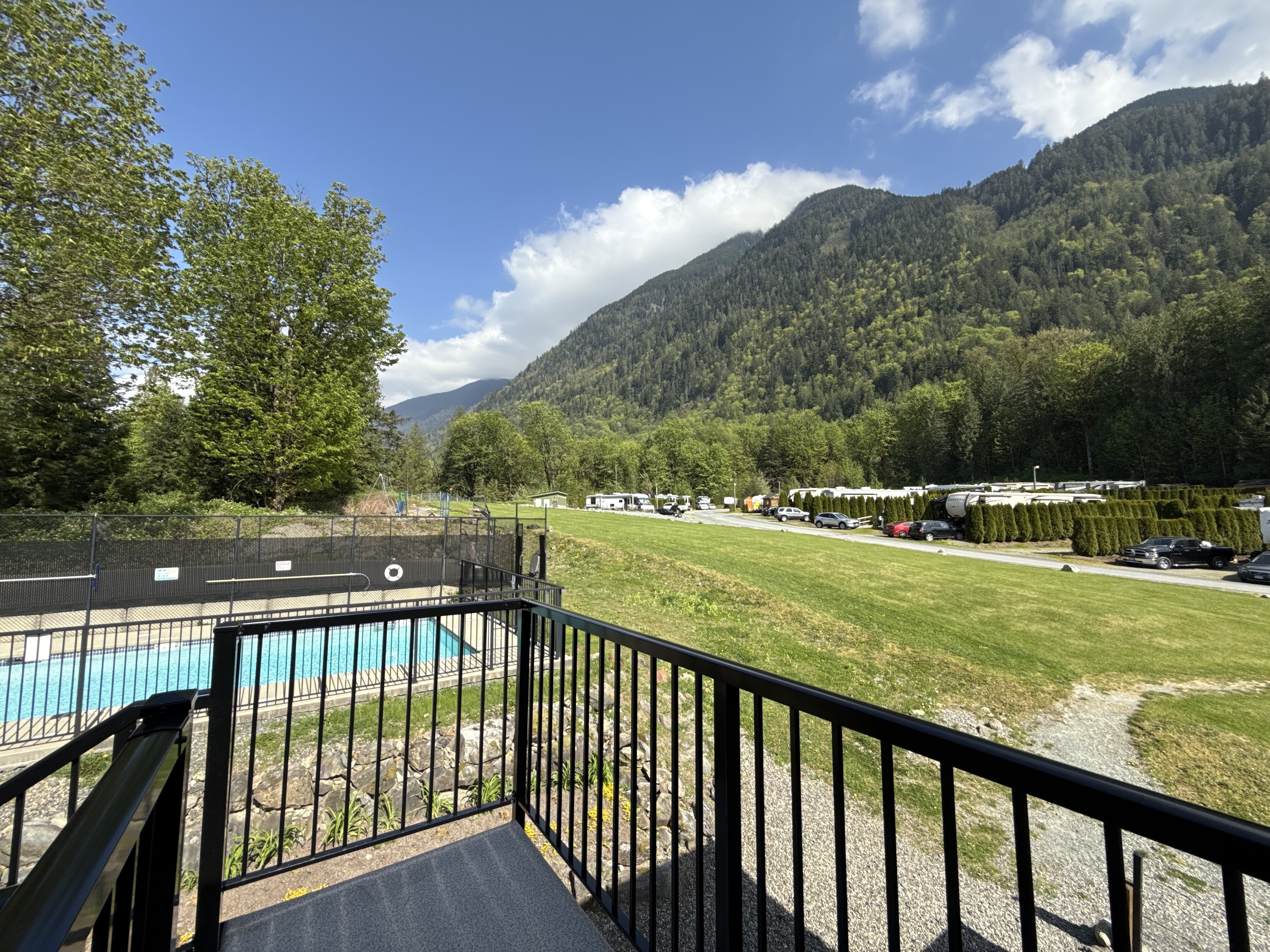 The pool seen from the lodge balcony above
